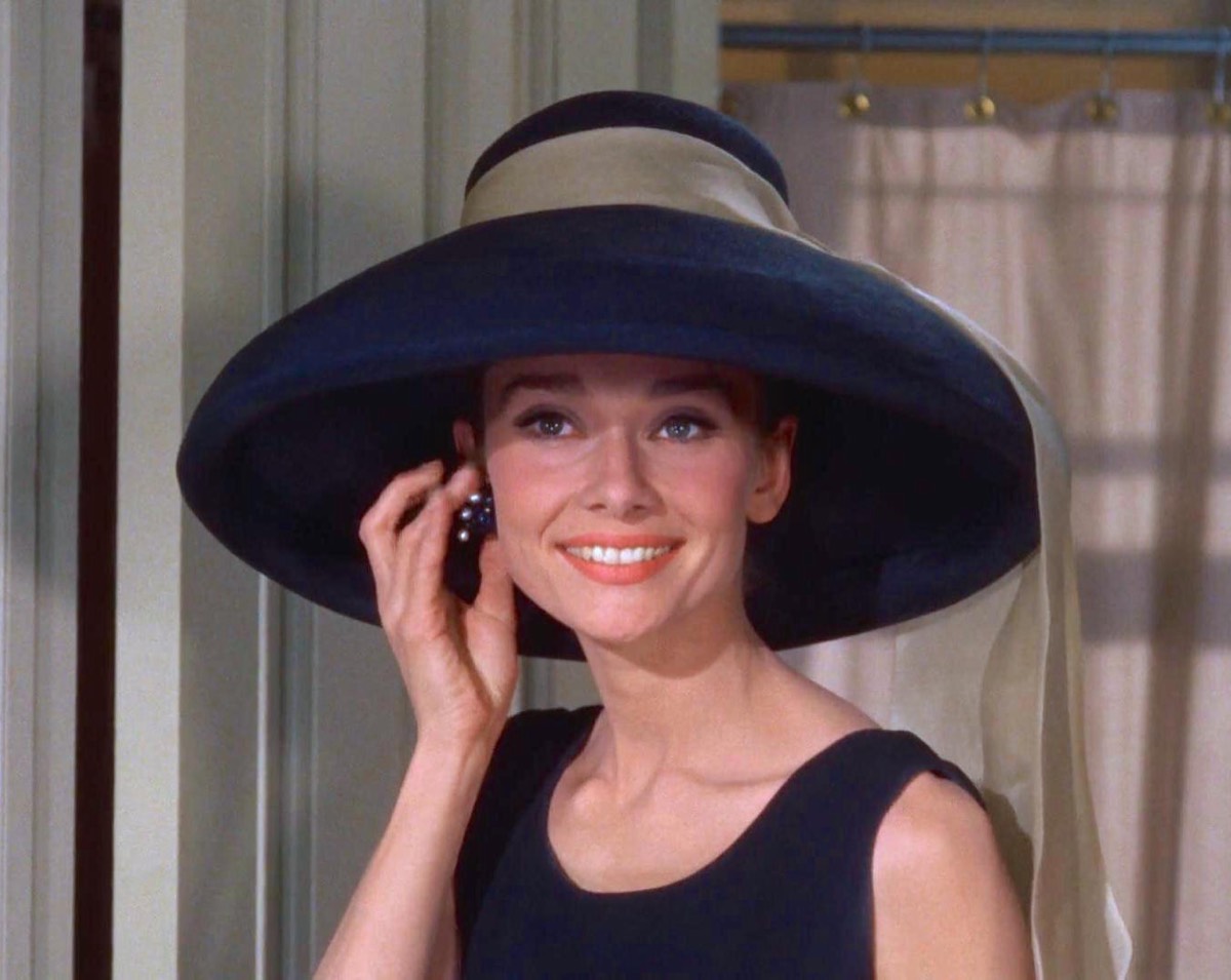 Audrey Hepburn: Wide-brim hat and black dress