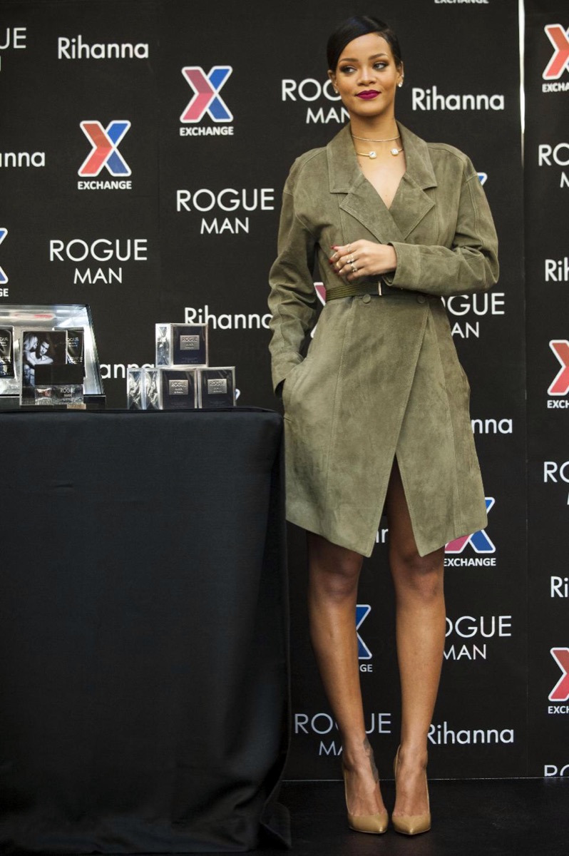 Rihanna wearing olive suede trench dress at Fort Belvoir