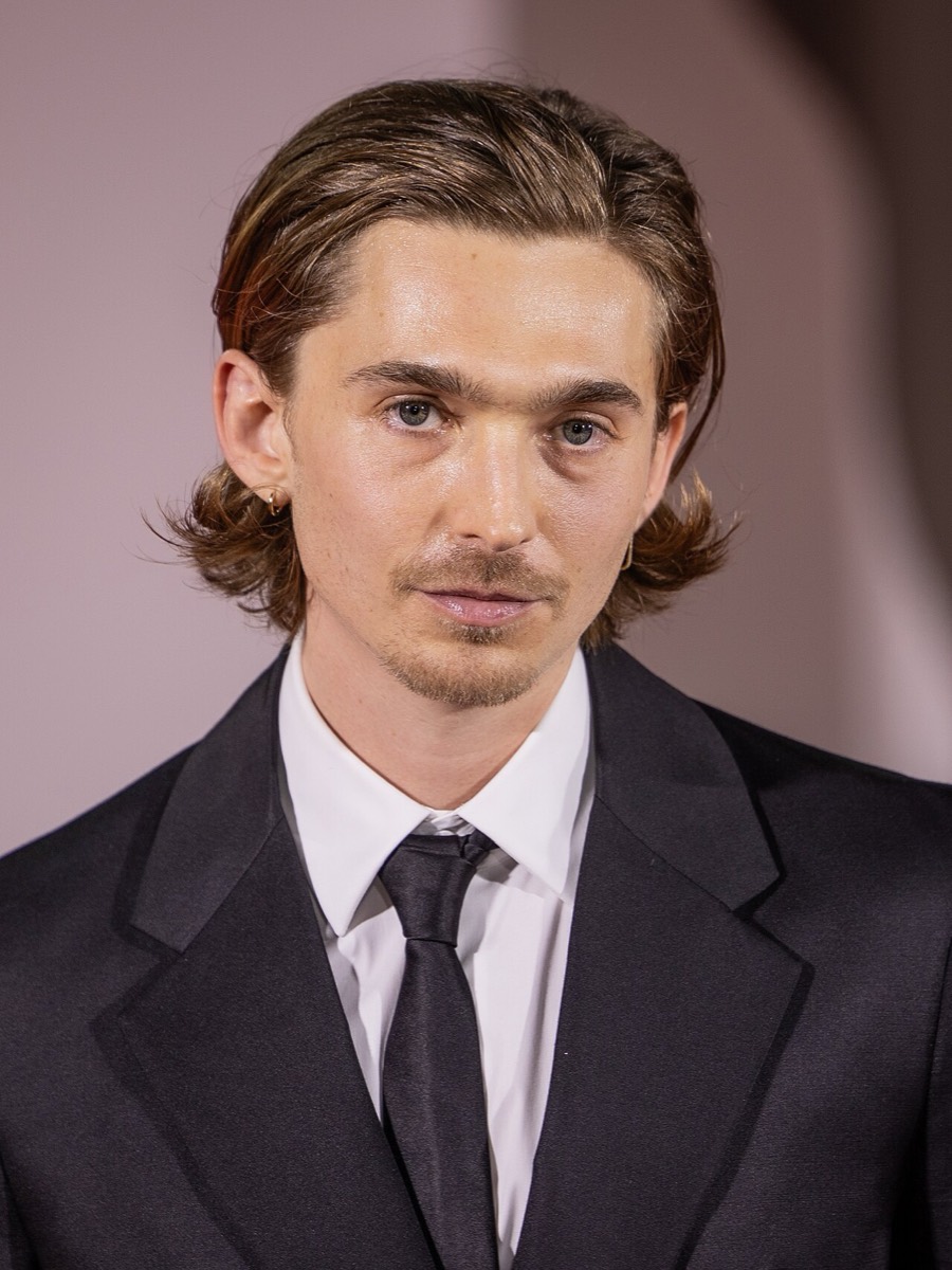 Austin Abrams: Black suit and skinny tie