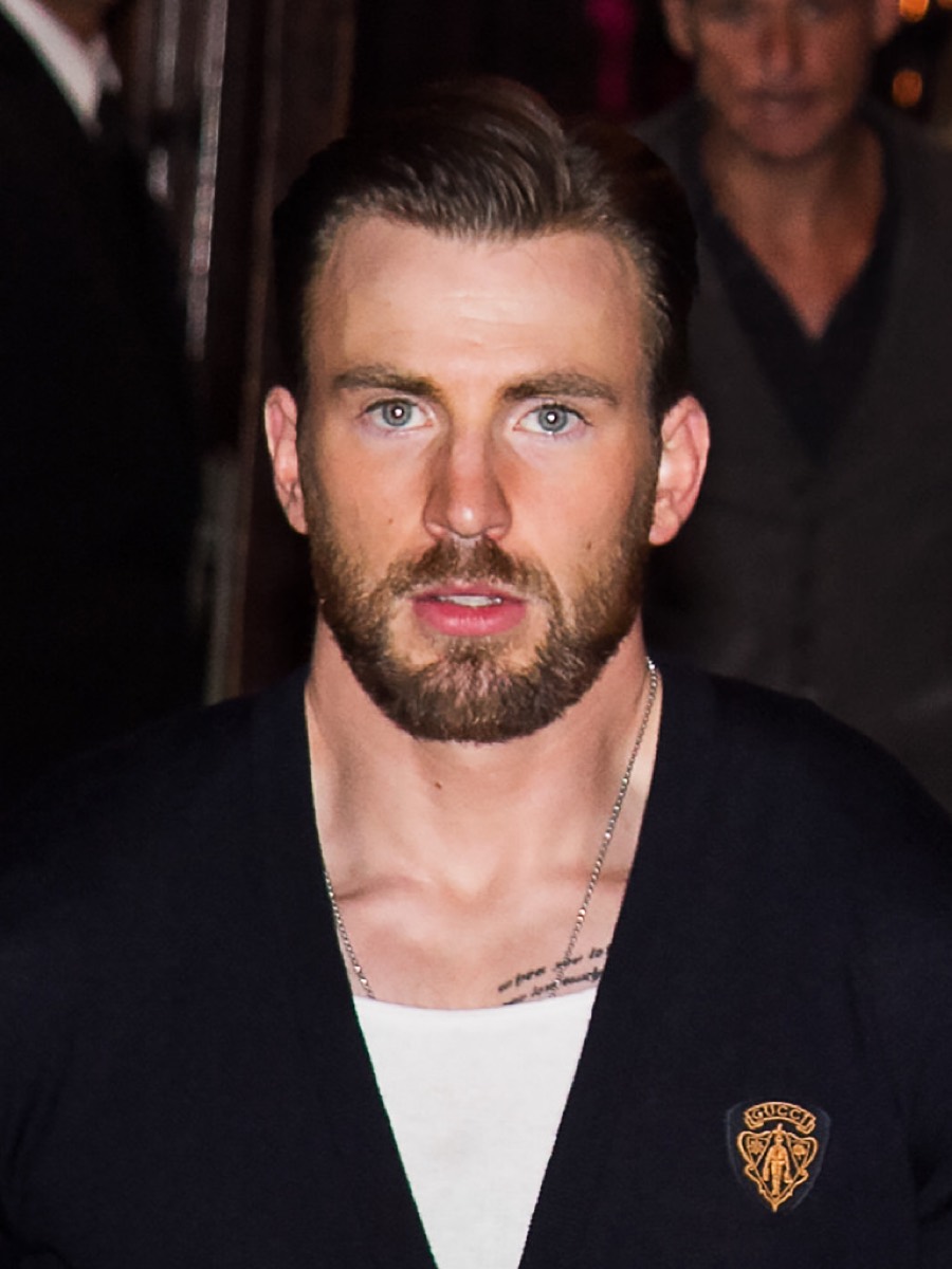 Chris Evans wearing black cardigan and white tee at Toronto Film Festival 2014