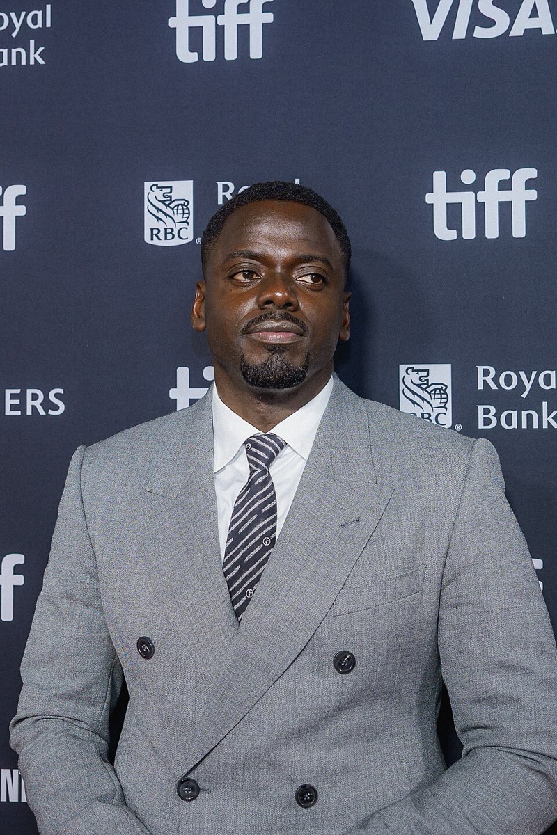 Daniel Kaluuya: Grey double-breasted suit and striped tie