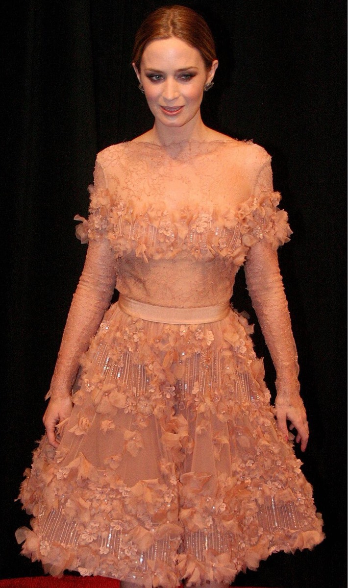 Emily Blunt wearing peach floral appliqué dress at The Adjustment Bureau premiere 2011