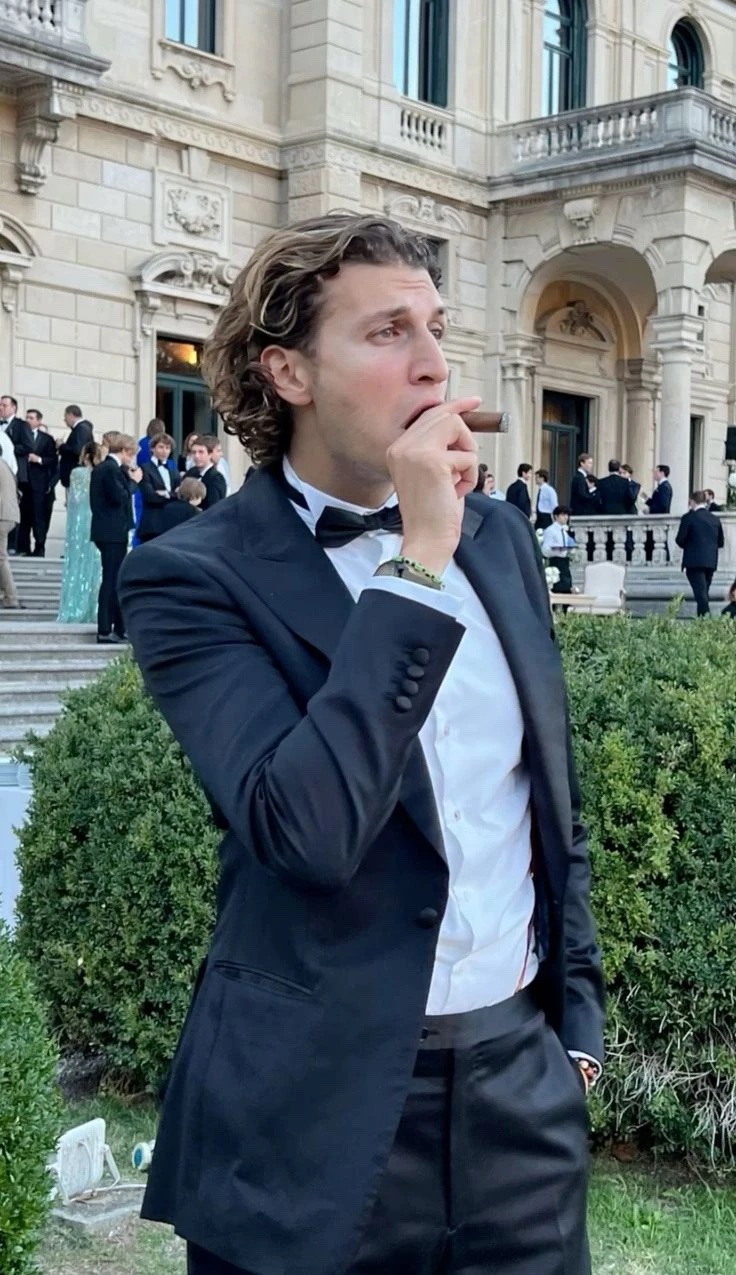 Gstaad Guy: Midnight navy tuxedo and black bow tie