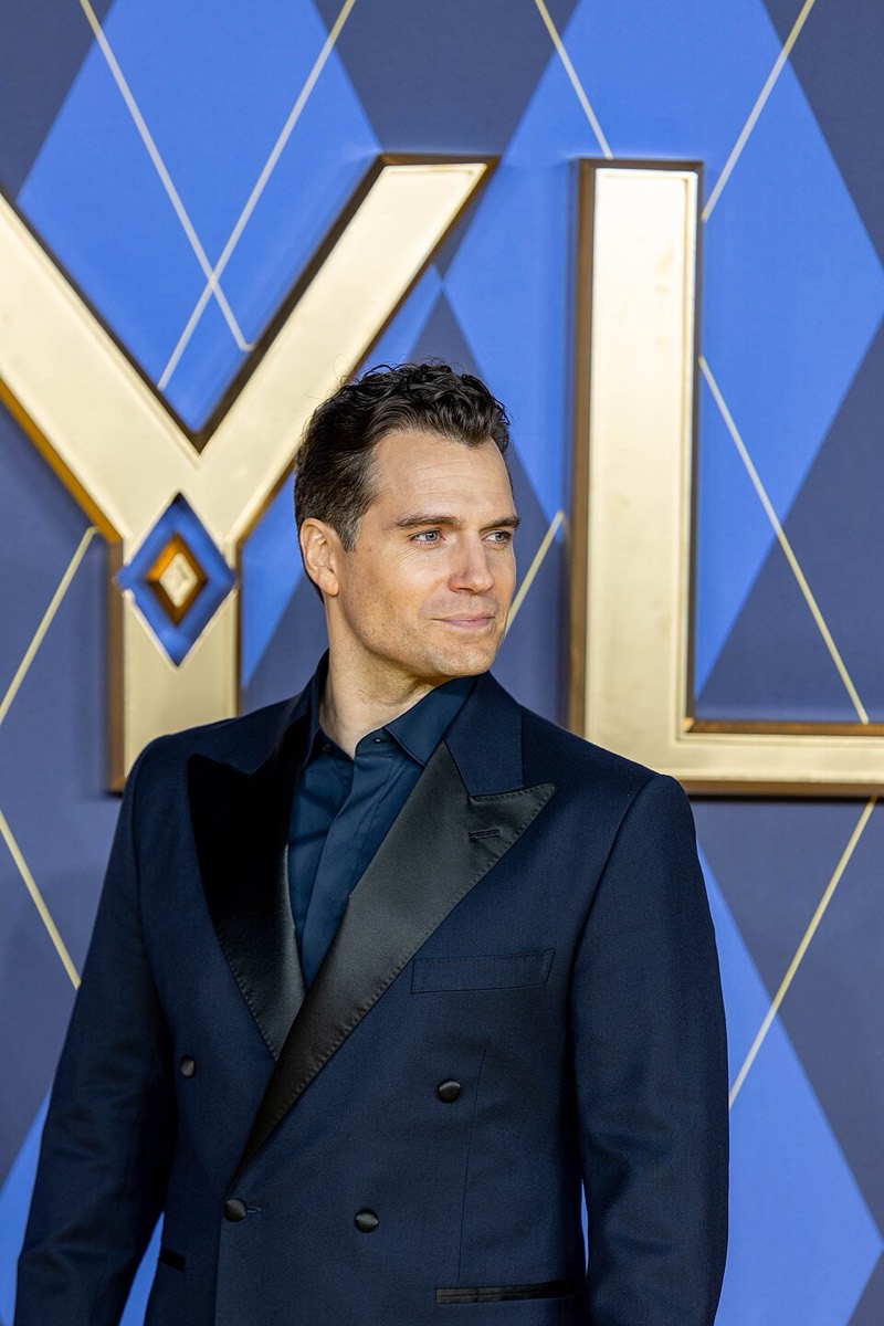 Henry Cavill wearing navy double-breasted dinner suit at Argylle premiere 2024