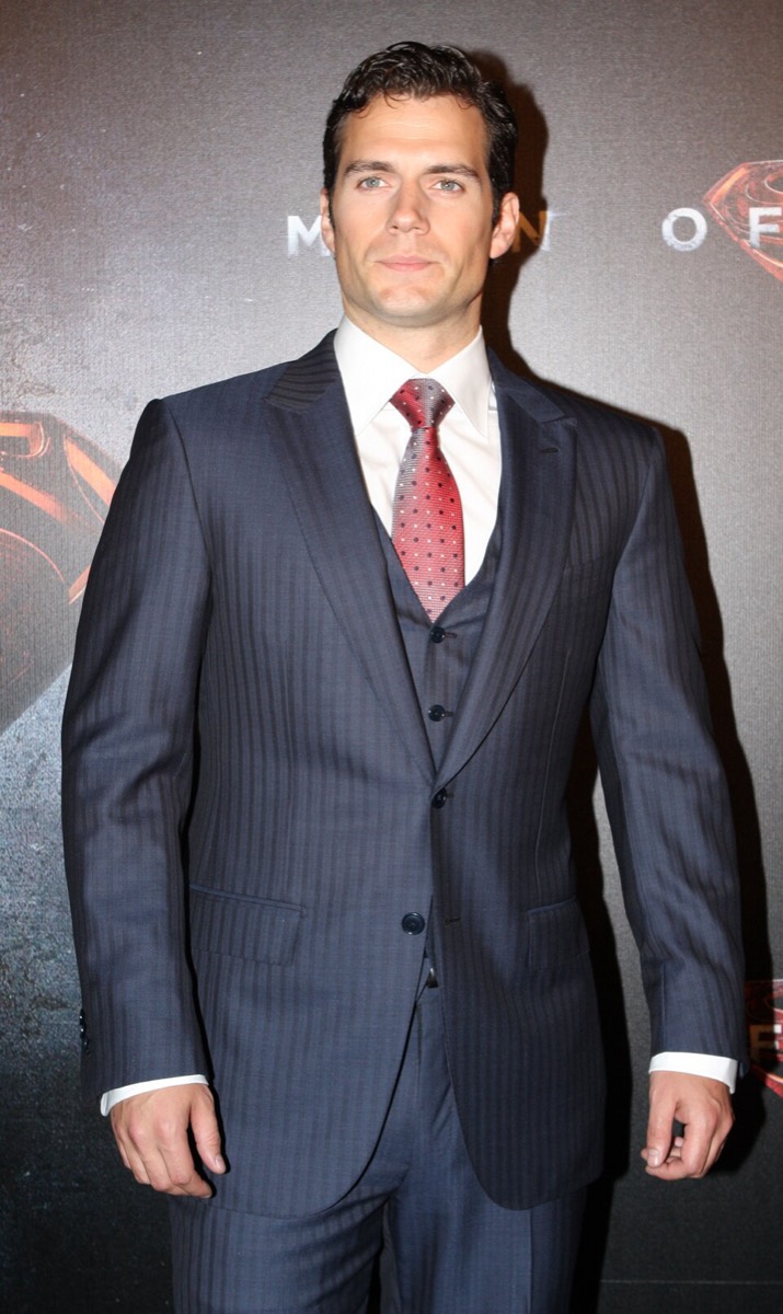 Henry Cavill: Pinstripe three-piece and red tie