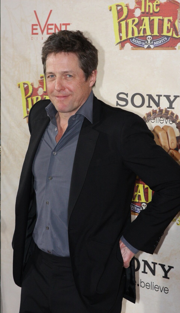Hugh Grant: Black blazer and grey shirt