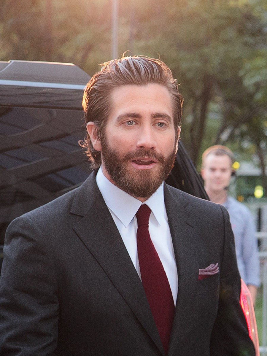 Jake Gyllenhaal: Charcoal suit and burgundy tie
