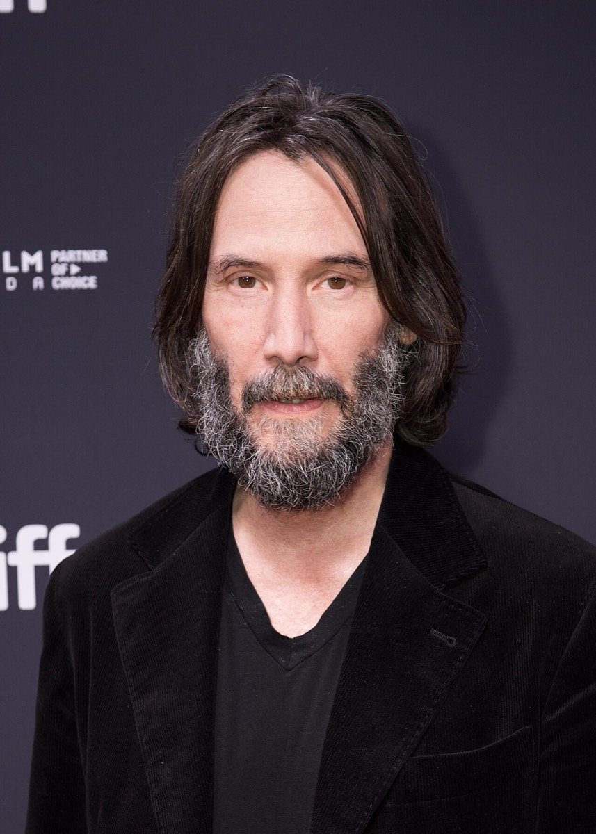 Keanu Reeves: Black velvet jacket and V-neck