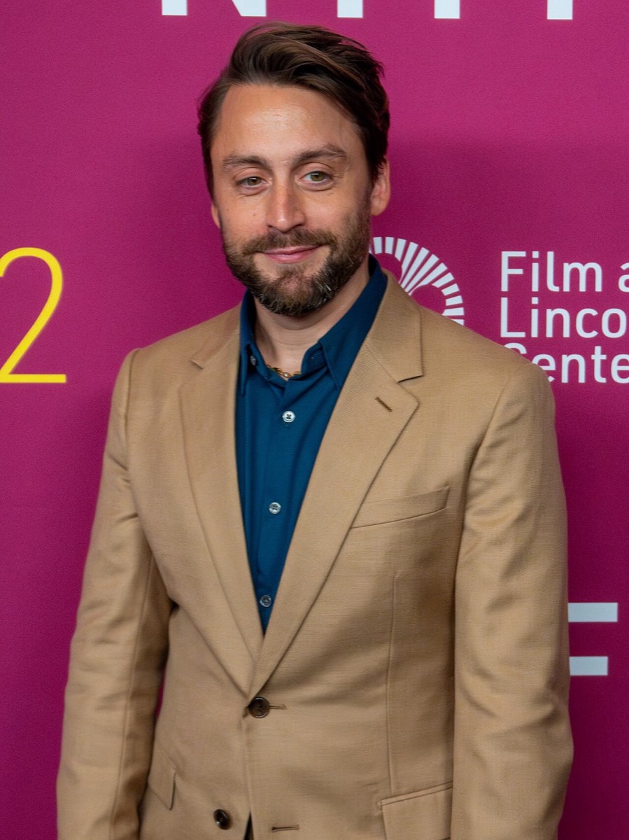 Kieran Culkin: Camel blazer and navy shirt
