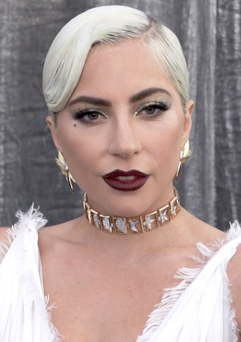 Lady Gaga: White feathered gown and crystal choker