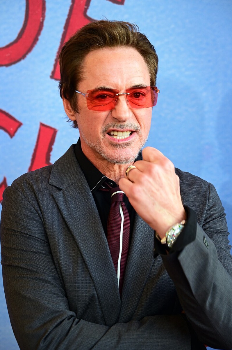 Robert Downey Jr.: Black suit and tinted glasses