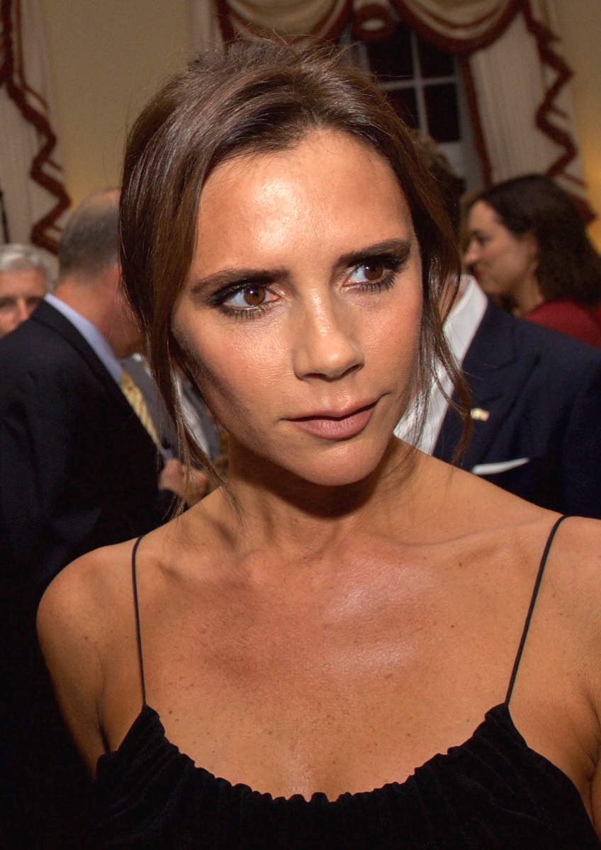 Victoria Beckham wearing black slip camisole at Washington 2015